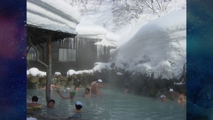 Japanese bathers in outdoor onsen